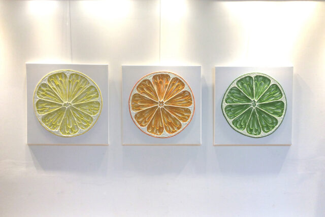 zesty fruit textured string wall art triptych for modern interiors, showing lemon, lime and orange slices.