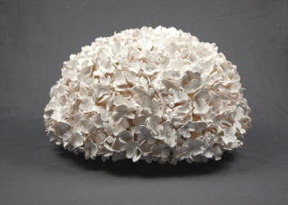 half ball shaped flower sculpture in matte white finish, large size with thousands of tiny flowers and buds, highly detailed piece perfect for interior design projects