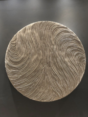 large round textured wall art in cream color, looks like waves and swirls, created in clay on wood, commissioned art for interior design